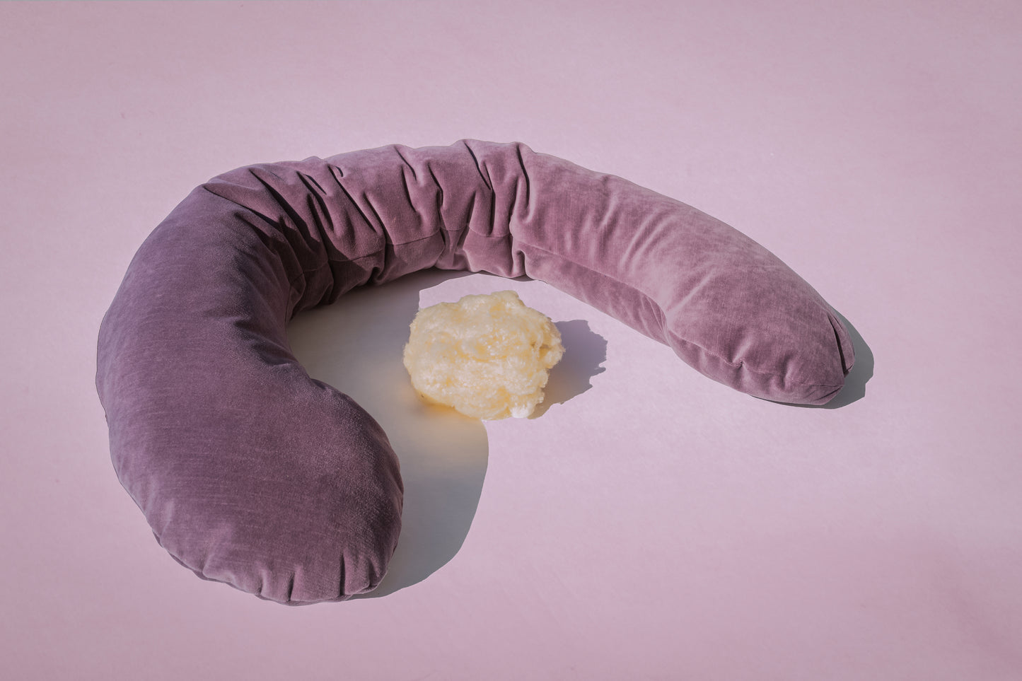 Inner fill is 100% wool, outside is velvet cotton cover. All natural, luxurious, supportive.